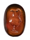 A roman garnet intaglio. Jug.