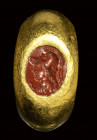 A roman red jasper intaglio mounted in a gold ring. Gryllos.