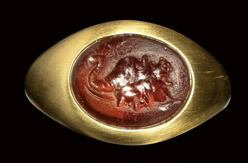 A roman carnelian intaglio mounted in a modern gold ring. Gryllos. 

1st - 2nd...