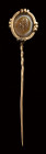 A roman agate intaglio set in a gold stick pin. Apollo.