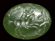 An eastern roman green chalcedony intaglio. Military fight scene.