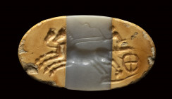A roman republican burnt agate intaglio. Biga.