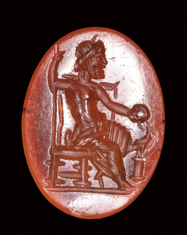 A roman carnelian intaglio. Seated Zeus.

2nd century A.D.

10x14x3 mm

Th...