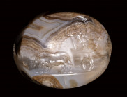 An eastern roman agate scaraboid engraved seal. The return of Dionysos.