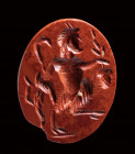 A roman red jasper intaglio. Pan.