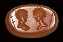 A roman agate intaglio. Two busts.