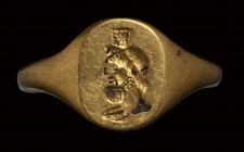 A roman or later engraved gold ring. Portrait of Serapis.