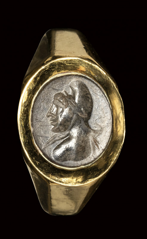 A roman jasper intaglio set in a modern massive gold ring. Bust of a Phrygian. ...