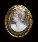 A roman agate cameo mounted in a gold ring. Male portrait.