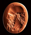 A roman red jasper intaglio. Bust of a  philosopher.