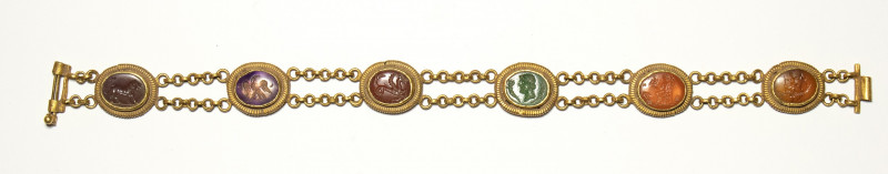 A roman gold bracelet with six hardstones intaglios. Various subjects.

2nd - ...