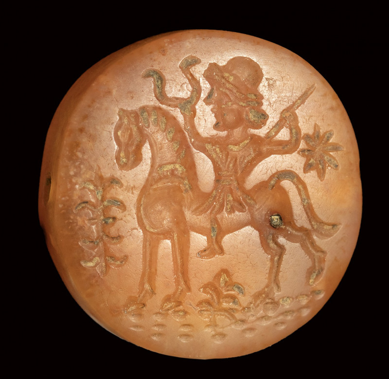 A rare early islamic carnelian seal intaglio. Horseman holding a tamga (?).

5...