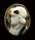 A fine onyx cameo set in a gold ring. Conjoined busts of Pericles and Aspasia.