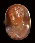 A fine agate cameo set in a gold brooch. Bust of Hermes.