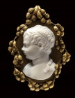 A large agate cameo set in a gold brooch. Bust of a child signed Amastini