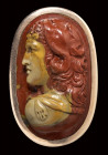 A fine bicolor jasper cameo set in a gold frame. Bust of Hercules.