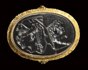 An important Grand Tour sard intaglio (two fragments) set in a gold ring. Lion and Bacchic scene.