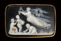 A large agate cameo set in a gold brooch. Allegorical scene.
