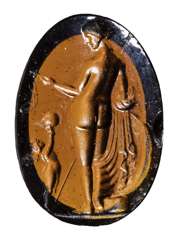 A Grand Tour brownish glass impression. Venus Victrix. 

19th century.

21x3...