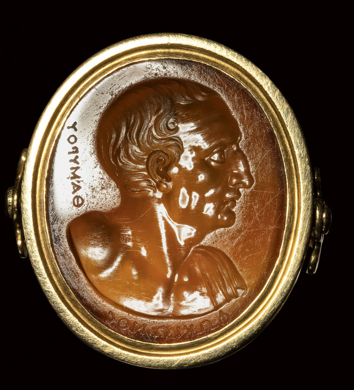 A fine neoclassical Poniatowski carnelian intaglio signed Thamyros, set in a gol...