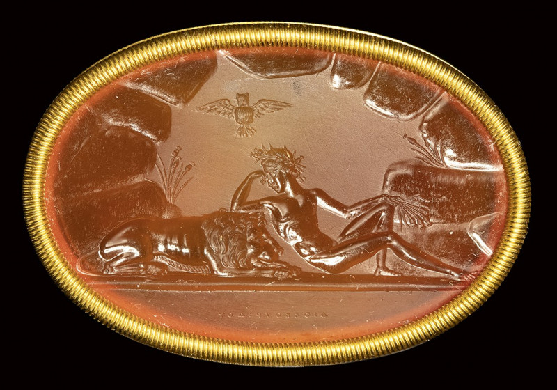 A fine neoclassical Poniatowski carnelian intaglio signed Dioscourides, set in a...