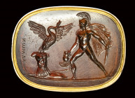 A fine neoclassical Poniatowski  carnelian intaglio signed Admon, set in a gold frame. Achilles and the metamorphosis of Cycnus.