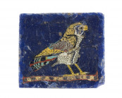 EGYPTIAN HORUS FALCON MOSAIC GLASS INLAY
Ptolemaic Period, ca. 300 - 30 BC
height cm 2; length cm 2,5; thick mm 5

A very detailed glass inlay: white ...