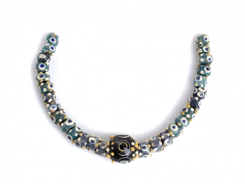 PHOENICIAN GLASS PASTE BEAD COMPOSED NECKLACE
4th - 3rd centuries BC
lenght cm 2...