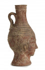 AFRICAN RED SLIP HEAD-FLASK
North Africa, near the style of Navigius's workshop, ca. AD 300 - 350
height cm 25,5

A girl with large almond-shaped eyes...