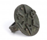 ROMAN BRONZE CIRCULAR BREAD STAMP
1st - 2nd centuries AD
diam. cm 6; height (with handle) cm 4,4

During the Roman era, bakeries were required to stam...