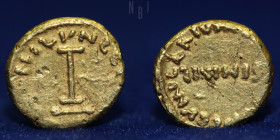 Arab Byzantine. time of al-Walid I or Suleyman AV 1/2 Dinar, 1.40gm, 10mm, RR