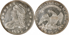 1822 Capped Bust Half Dollar. O-103. Rarity-4. AU-53 (PCGS).

Brilliant apart from delicate wheat-gold edge highlights, both sides also display a bo...