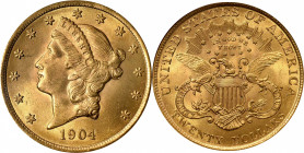 1904 Liberty Head Double Eagle. MS-65 (NGC).

This is a tremendously beautiful example with intense yellow-gold hues and uniform satiny luster. Alth...
