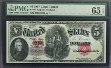 Fr. 85. 1907 $5 Legal Tender Note. PMG Gem Uncirculated 65 EPQ.

Bold ruby red overprints of the serial numbers, seal and "V" counter pop on this wo...