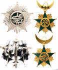 Comoros Order of Merit of Comores Grand Cross Set 1960 - 1980
Badge in gilded bronze and enamel, 48,4gr. Star silver,98gr. Hallmark of the Arthus-Ber...