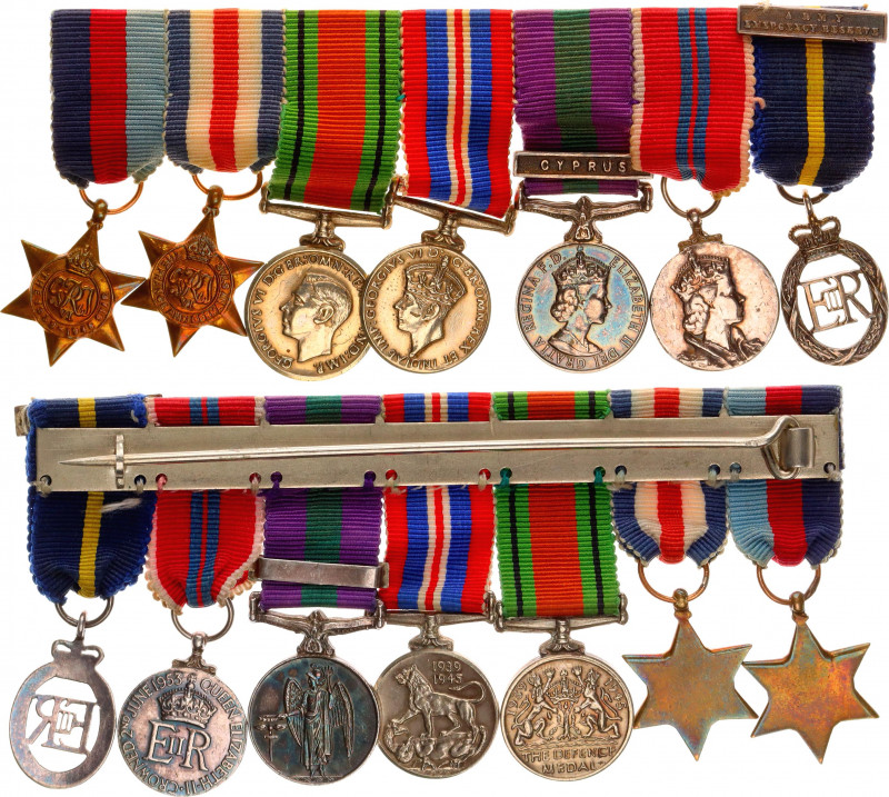 Great Britain Medal Bar with 7 Miniatures of WWII 1939 - 1945
with original rib...