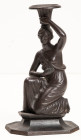 VARIA
OBJEKTE aus EISENKUNSTGUSS
Kerzenleuchter um 1847 mit knieender weiblicher Figur, den Kerzenhalter mit erhobener linken Hand haltend. Höhe 23 ...