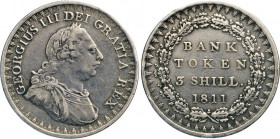 AUSLÄNDISCHE MÜNZEN
GROSSBRITANNIEN
George III., 1760–1820. 3 Shillings 1811 Banktoken, London. Spink 3769. 14,49 g. Rdd., berieben.
ss