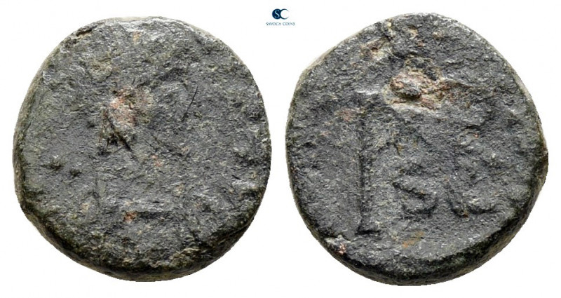 Marcian AD 450-457. 
Nummus Æ

9 mm, 1,22 g



fine