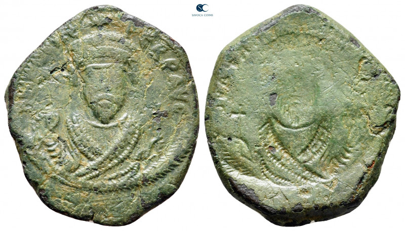 Phocas AD 602-610. 
Brockage Follis or 40 Nummi Æ

25 mm, 6,22 g



nearl...