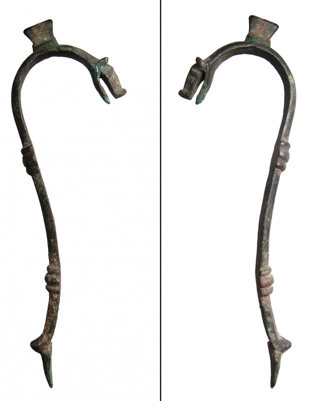 A Roman bronze handle for a vessel, ca. 1st - 3rd Century A.D. , the rim attachm...