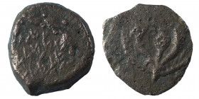 JUDAEA. Hasmoneans. Judas Aristoboulos I (Yehudah). 104-103 BCE. Ae Prutah (bronze, 1.45 g, 13 mm). Jerusalem mint. Legend in five lines within wreath...