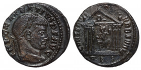 Maxentius, 307-312. Follis (bronze, 5.88 g, 24 mm), Rome.IMP C MAXENTIVS P F AVG. Laureate head right. Rev. CONSERV VRB SVAE. Hexastyle temple, with w...