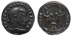 Maxentius, 307-312. Follis (bronze, 5.76 g, 25 mm), Ostia. IMP C MAXENTIVS P F AVG. Laureate head right. Rev: AETE-RNITAS AVG N. Wolf and twins betwee...