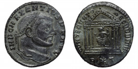 Maxentius, 307-312. Follis (bronze, 5.91 g, 25 mm), Rome. Struck 307. IMP C MAXENTIVS P F AVG Laureate head right. Rev. Roma seated facing, head left,...