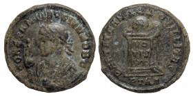 Constantine II, as Caesar, 316-337. Nummus (bronze, 3.01 g, 14 mm). Trier, struck 321. CONSTANTINVS IVN NOB C laureate and draped bust left, holding V...