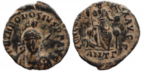 Honorius, 393-423. Follis (bronze, 2.03 g, 16 mm). Antioch, struck 401-403. D N HONORIVS P F AVG pearl-diademed, helmeted and cuirassed bust facing sl...
