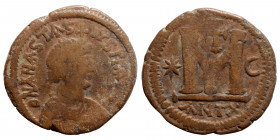 Anastasius, 491-518., Follis, (bronze, 16.00 g, 33 mm). D N ANASTASIVS PP AVG Diademed bust right, cross above. Rev. Large M between star and crescent...