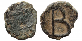 Justinian I, 527-565. 2 Nummi (bronze, 0.72 g, 11 mm). Carthage, struck 533-562. Diademed, draped, and cuirassed bust right; crosses flanking. Rev. La...