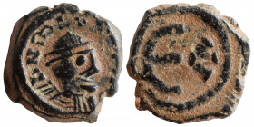 Justinian I, 527-565. Pentanummium (bronze, 1.32 g, 12 mm). Uncertain mint, contemporary or Vandals imitation. Illegible legend; bust right. Rev. Larg...